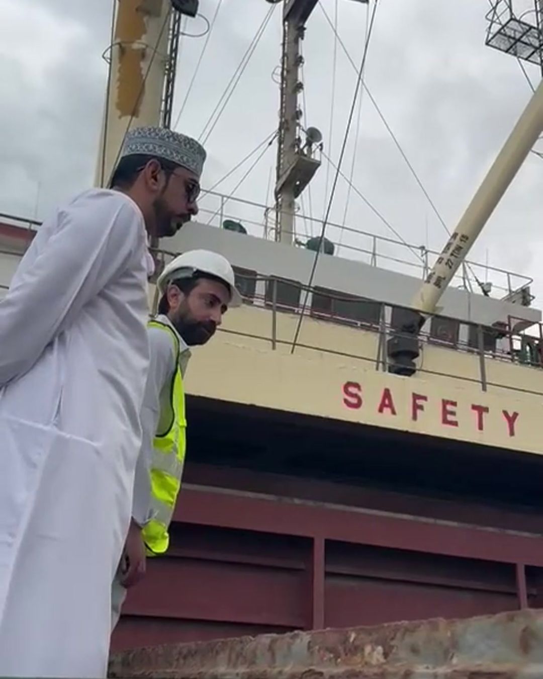 Cargo vessel alongside at an Omani port terminal